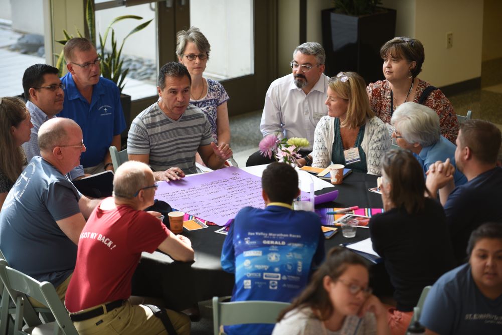 Organizers discuss Dominican University's "¡El Futuro is Here!: Cuentos y Recuerdos for the Journey." (Courtesy of Dominican University)