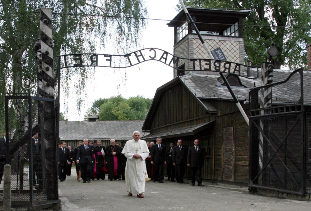 Pope Benedict XVI walks through the gate of Auschwitz, in this May 28, 2006, file photo. (CNS/Reuters/Pawel Kopczynski)