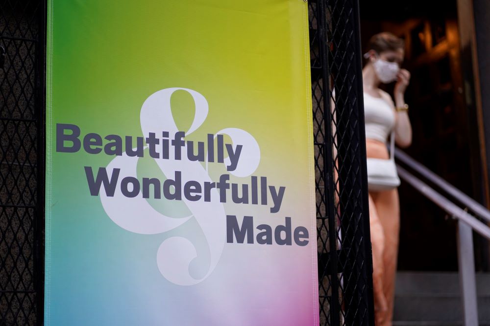 A banner hangs outside St. Francis of Assisi Church in New York City following an annual Pre-Pride Festive Mass June 26. The liturgy, hosted by the parish's LGBT Ministry, is traditionally celebrated on the eve of the city's Pride march.