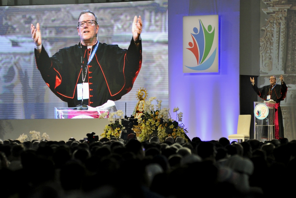 Los Angeles Auxiliary Bishop Robert Barron speaks at a session of the 51st International Eucharistic Congress in Cebu, Philippines, in 2016. (CNS/Katarzyna Artymiak)