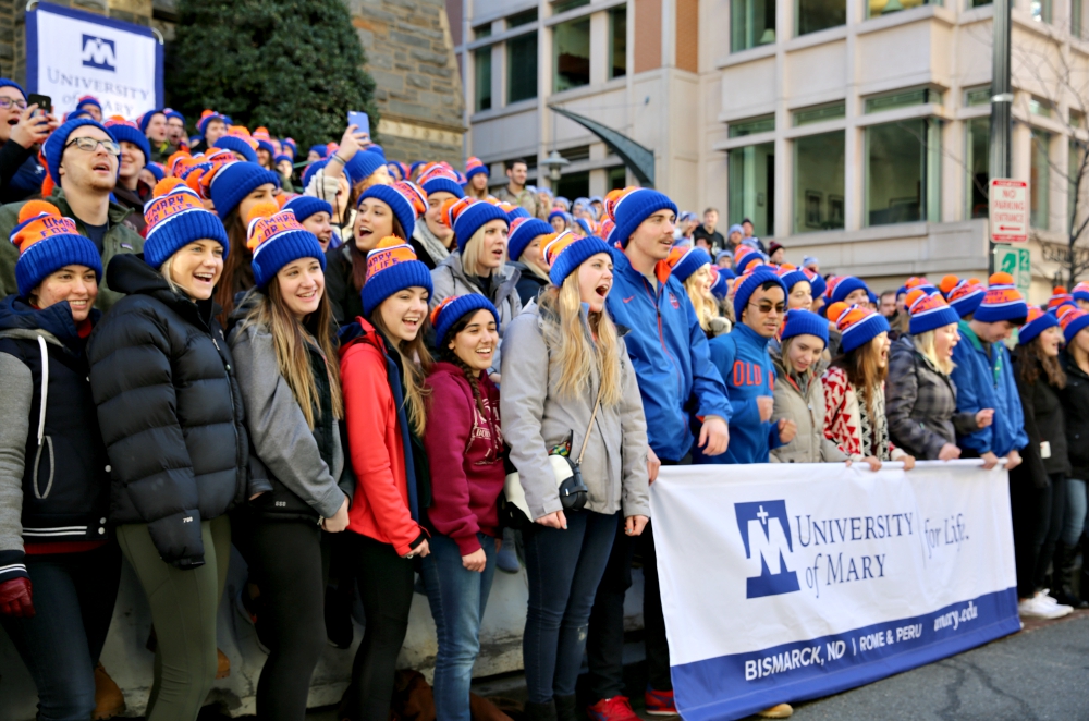 Students from the University of Mary in Bismarck, North Dakota, chant pro-life cheers Jan. 27, 2017, outside of St. Patrick's Catholic Church in Washington, D.C., as they prepare to participate in that year's March for Life. (CNS/Chaz Muth)