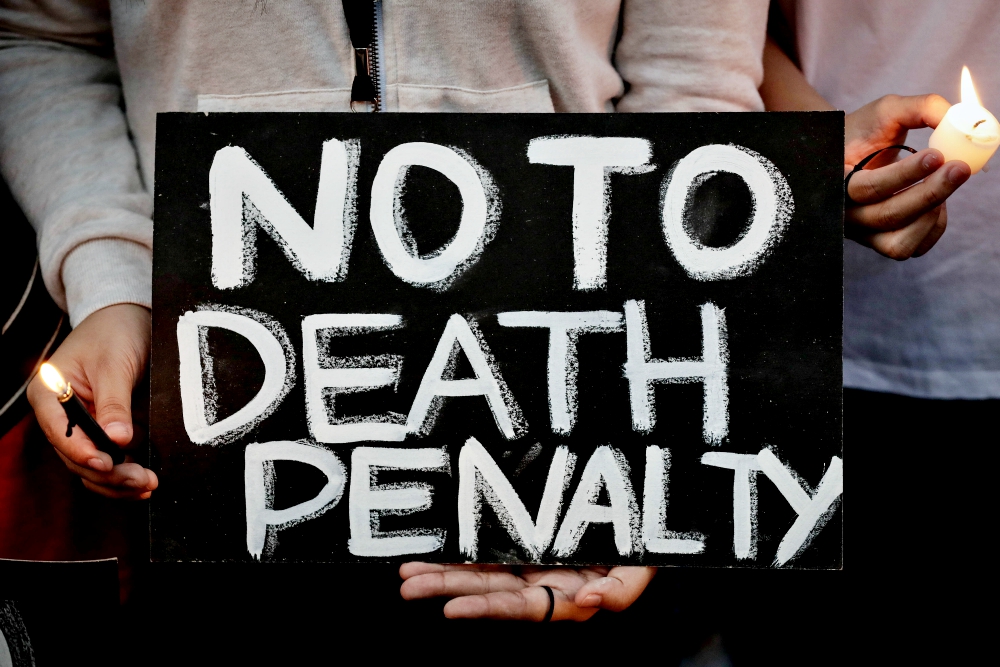 Filipinos join a March 8, 2017, protest against the death penalty in Manila. (CNS/EPA/Mark R. Cristino)