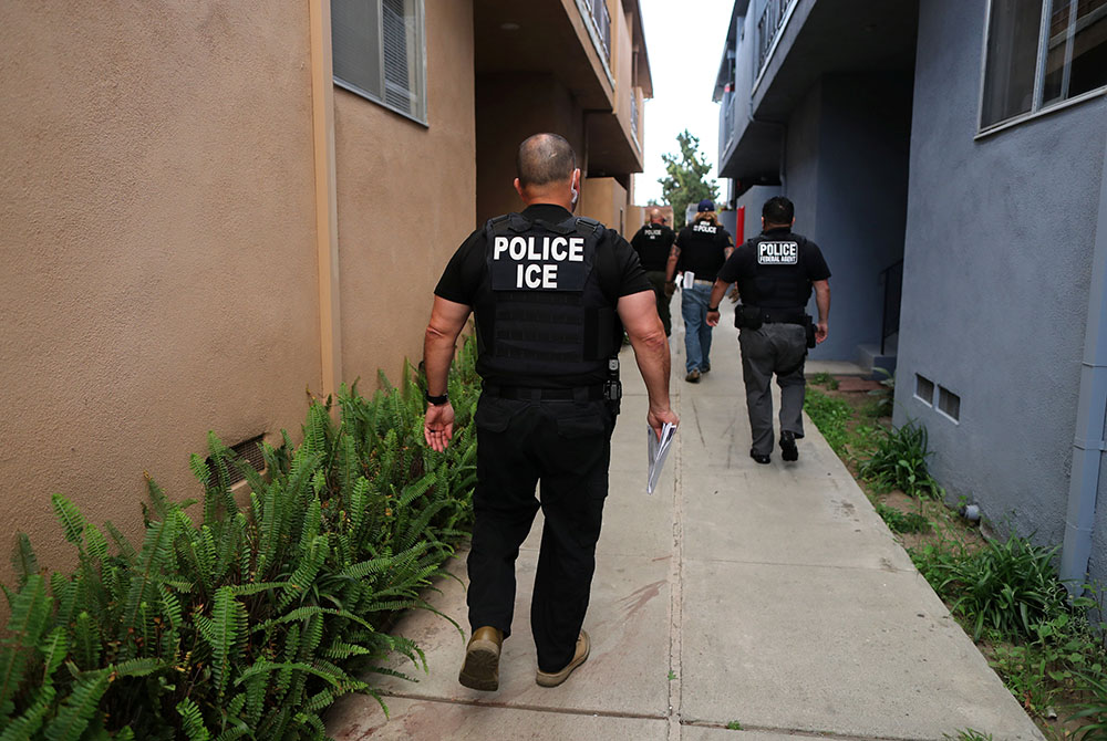 U.S. Immigration and Customs Enforcement personnel are seen March 1 in Hawthorne, California. (CNS/Lucy Nicholson, Reuters)