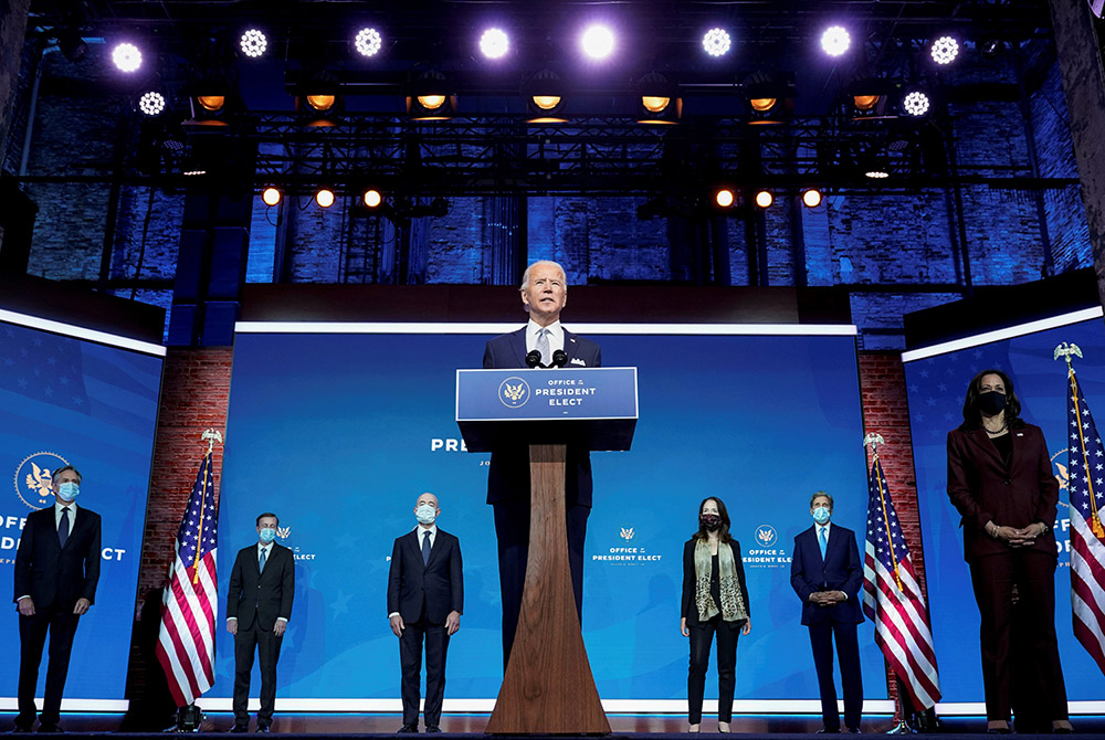 President-elect Joe Biden stands with his nominees for his national security team at his transition headquarters in the Queen Theater Nov. 24, 2020, in Wilmington, Delaware. (CNS/Joshua Roberts, Reuters)