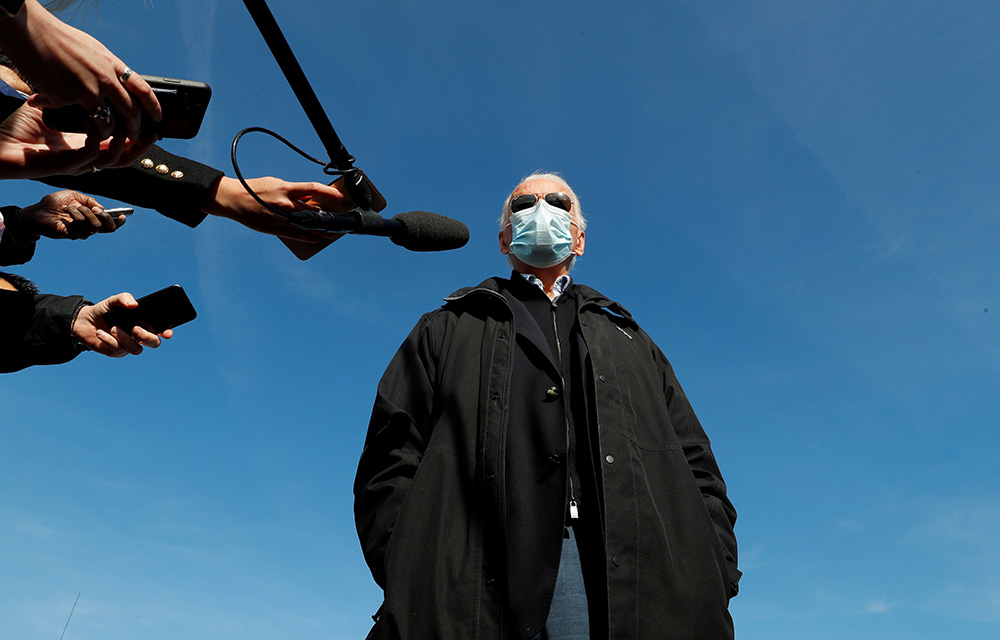 President-elect Joe Biden speaks to reporters Dec. 15, 2020, as he departs New Castle, Delaware, for travel to Georgia to campaign for Democratic senatorial candidates. (CNS/Reuters/Mike Segar)