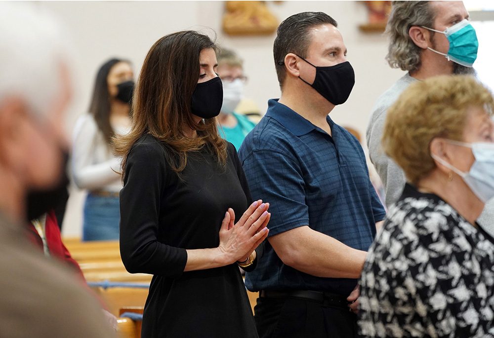 Worshippers attend Easter Mass April 4, 2021, at St. Peter the Apostle Church in Islip Terrace, New York. (CNS/Gregory A. Shemitz)