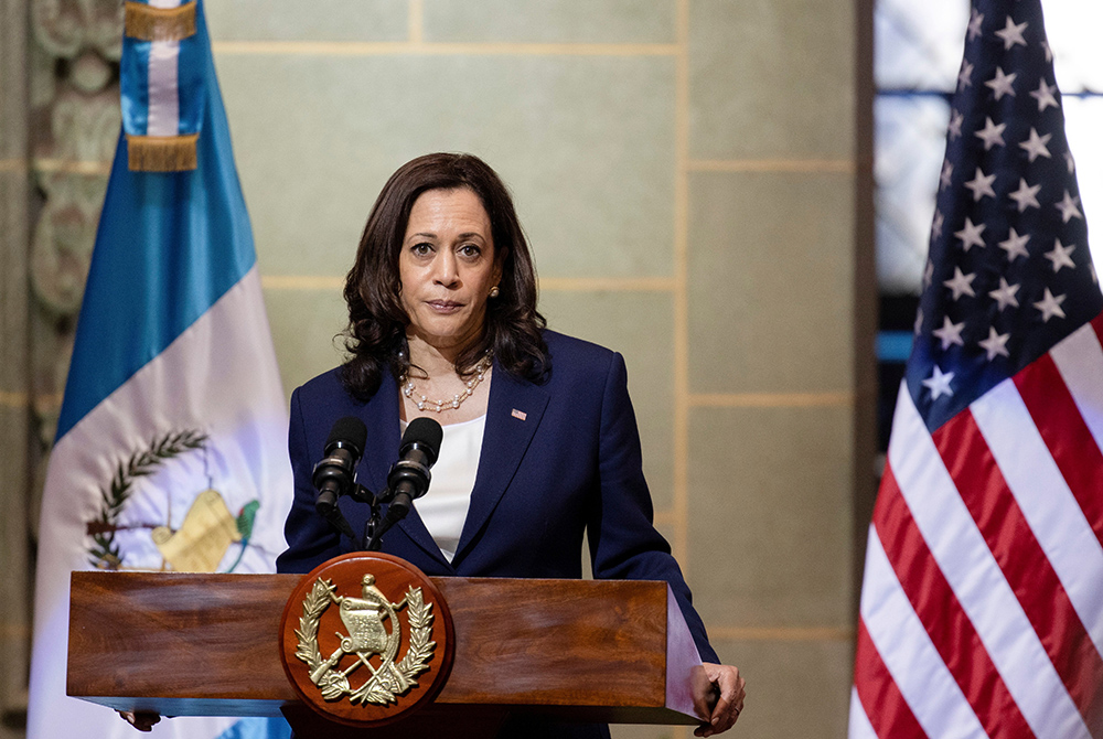 U.S. Vice President Kamala Harris addresses a news conference held with Guatemalan President Alejandro Giammattei June 7 in Guatemala City. "Do not come. Do not come," Harris said in a message to would-be asylum-seekers. "The United States will continue t