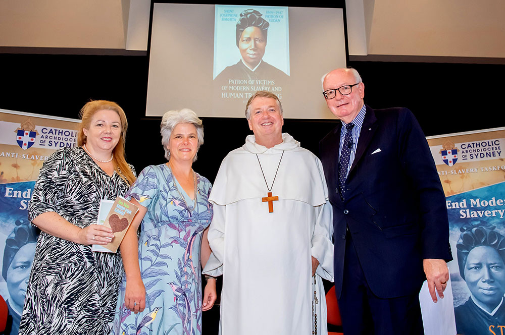 Alison Rahill, left, Jenny Stanger and John Fisher of the Sydney Archdiocese's Anti-Slavery Task Force are joined by Archbishop Anthony Fisher at a seminar on ethical sourcing of products in 2020. (CNS)