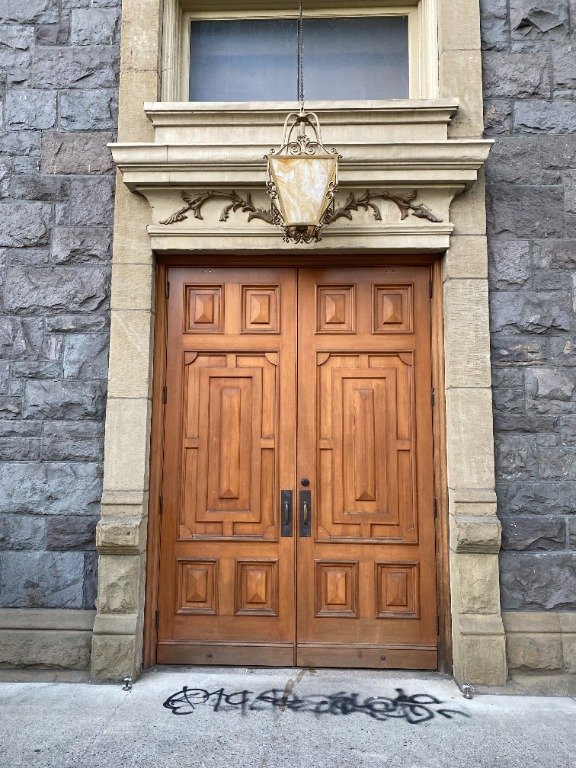 A vandal spray painted the ground in front of St. Patrick Church in Northwest Portland, Oregon, lit a fire and performed a dance sometime in June 2021. Parish staff are discussing ways to beef up security measures. (CNS photo/Courtesy Catholic Sentinel/St