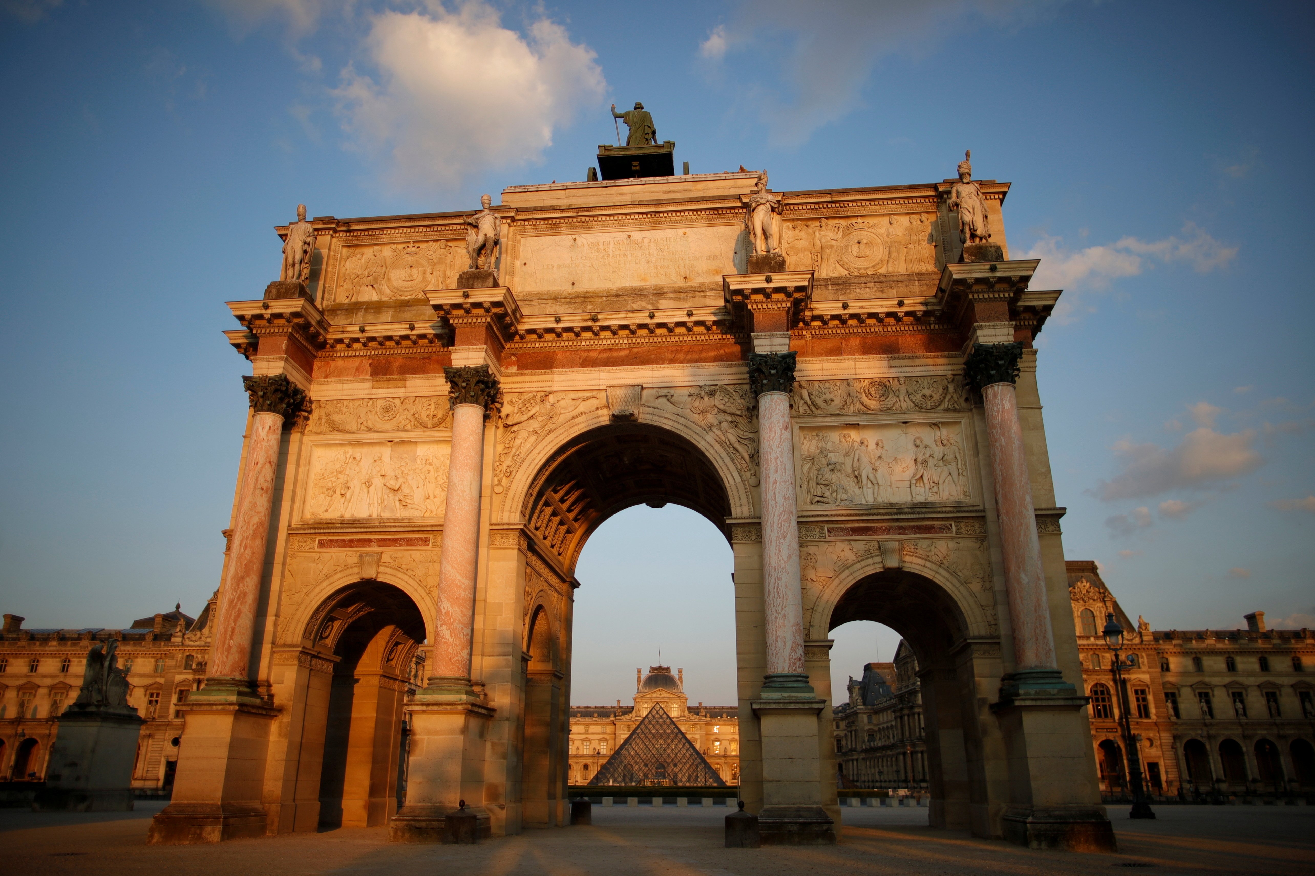 The sun illuminates Paris' famed Arc de Triomphe April 19, 2021. Bishop Nunzio Galantino, president of the Administration of the Patrimony of the Holy See, said the Vatican's purchase of a property near the Arc in 2017 was made "to increase income for the