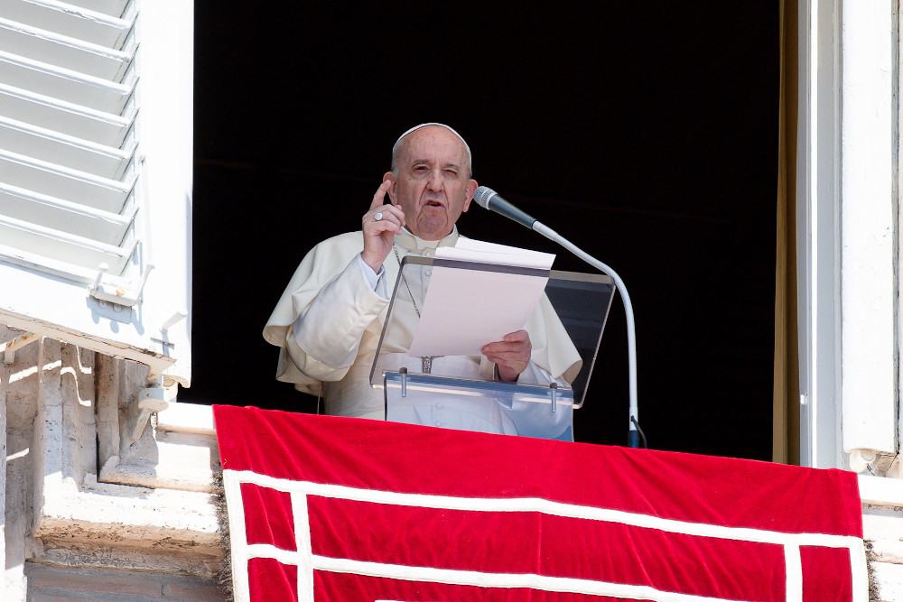 Pope Francis speaks as he leads the Angelus from the window of his studio overlooking St. Peter's Square at the Vatican Aug. 29. (CNS/Vatican Media)