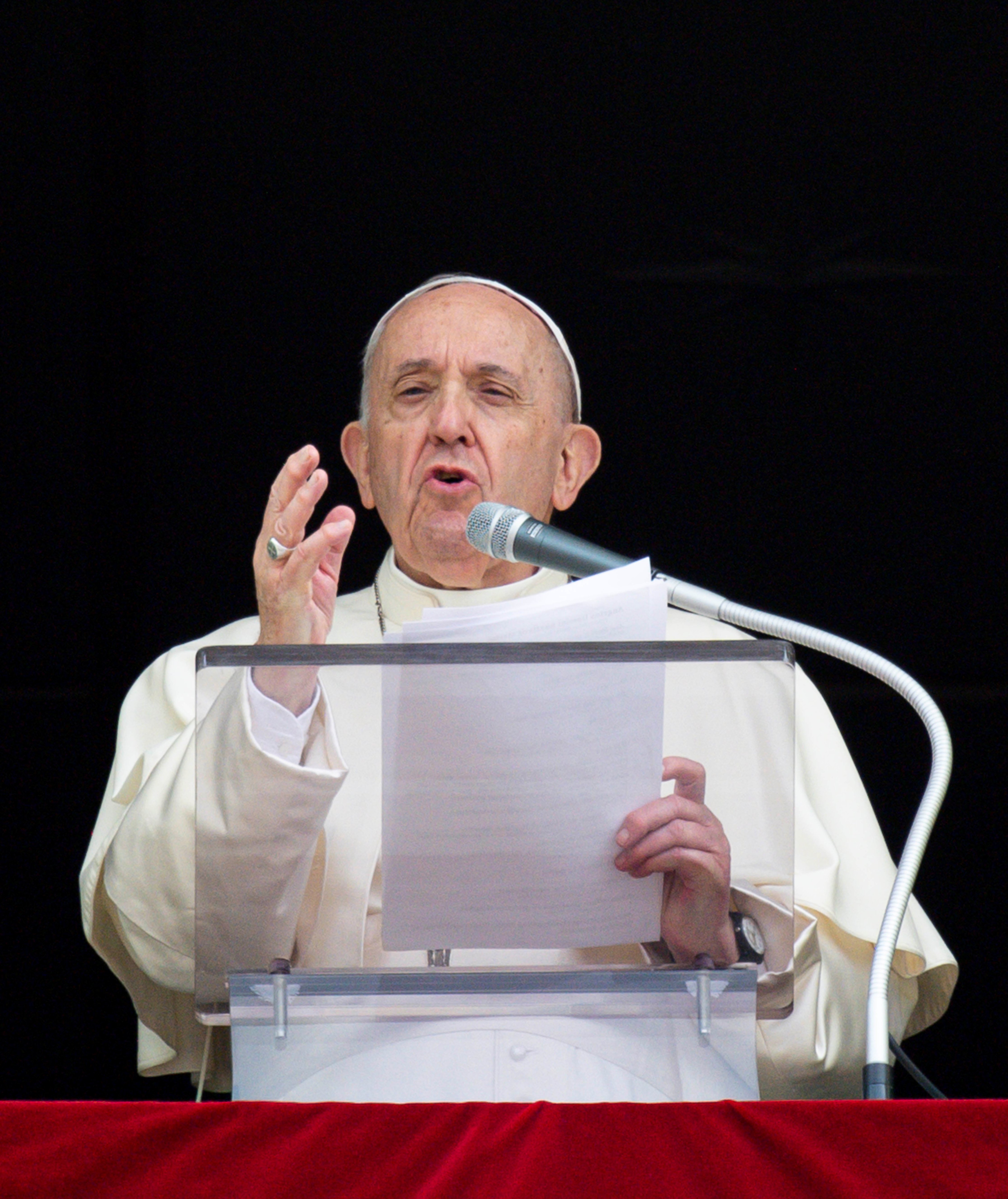 Pope Francis speaks as he leads the Angelus from the window of his studio overlooking St. Peter's Square at the Vatican Sept. 26, 2021. (CNS photo/Vatican Media)