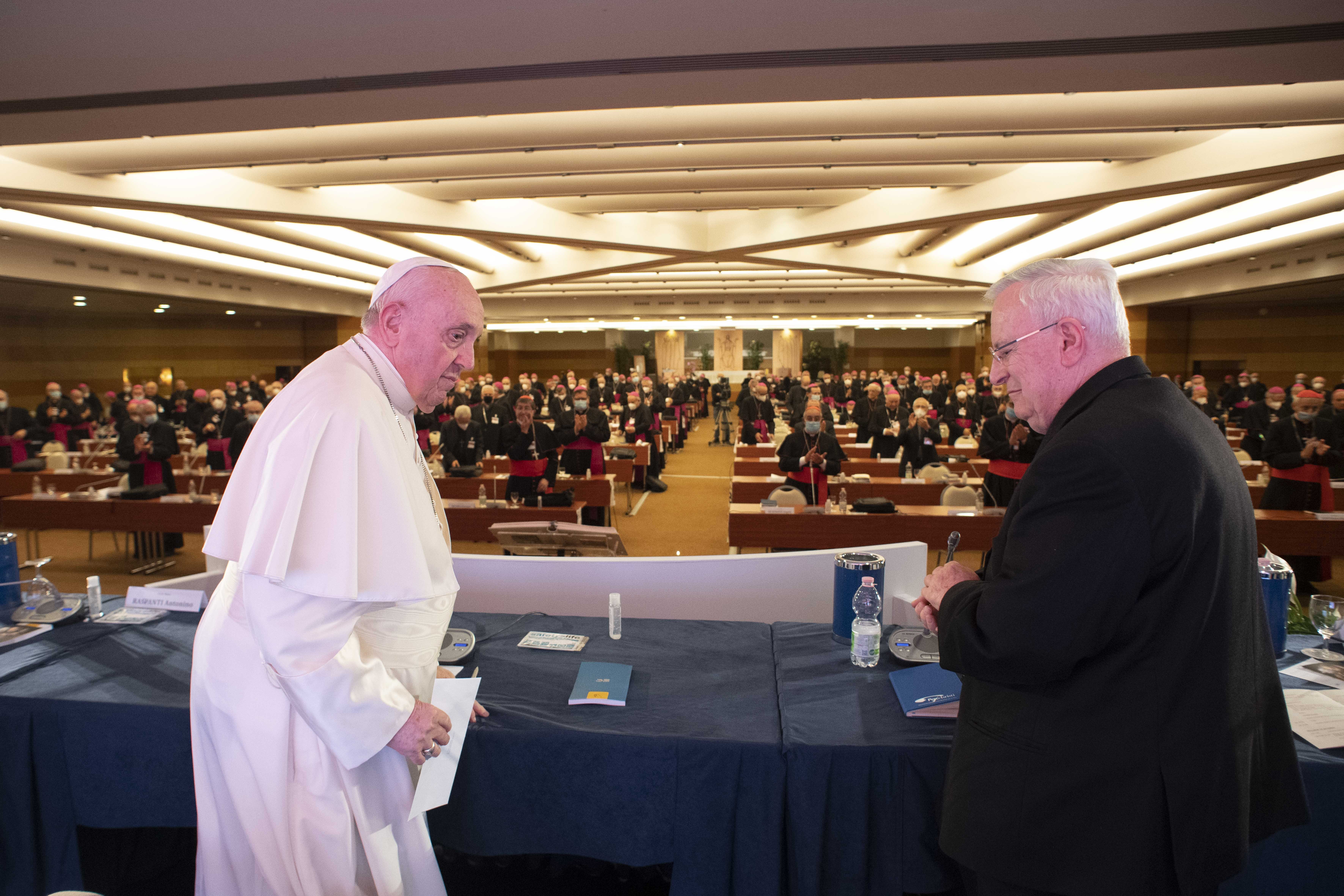 Pope Francis and Cardinal Gualtiero Bassetti of Perugia-Citta della Pieve, president of the Italian bishops' conference, attend the extraordinary general assembly of the Italian bishops on "the synodal journey of the church in Italy," in Rome Nov. 22, 202