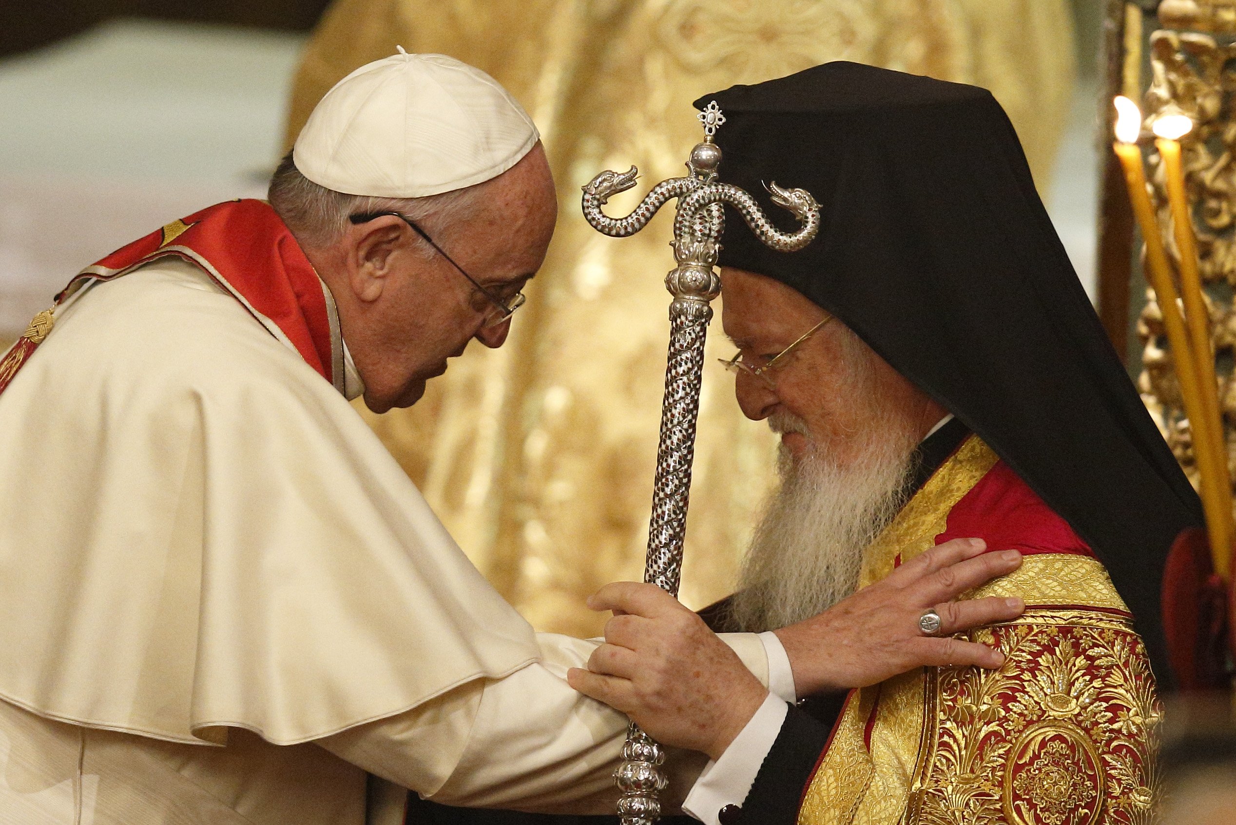 Pope Francis and Ecumenical Patriarch Bartholomew of Constantinople embrace during a prayer service in the patriarchal Church of St. George in Istanbul in this Nov. 29, 2014, file photo.  (CNS photo/Paul Haring)