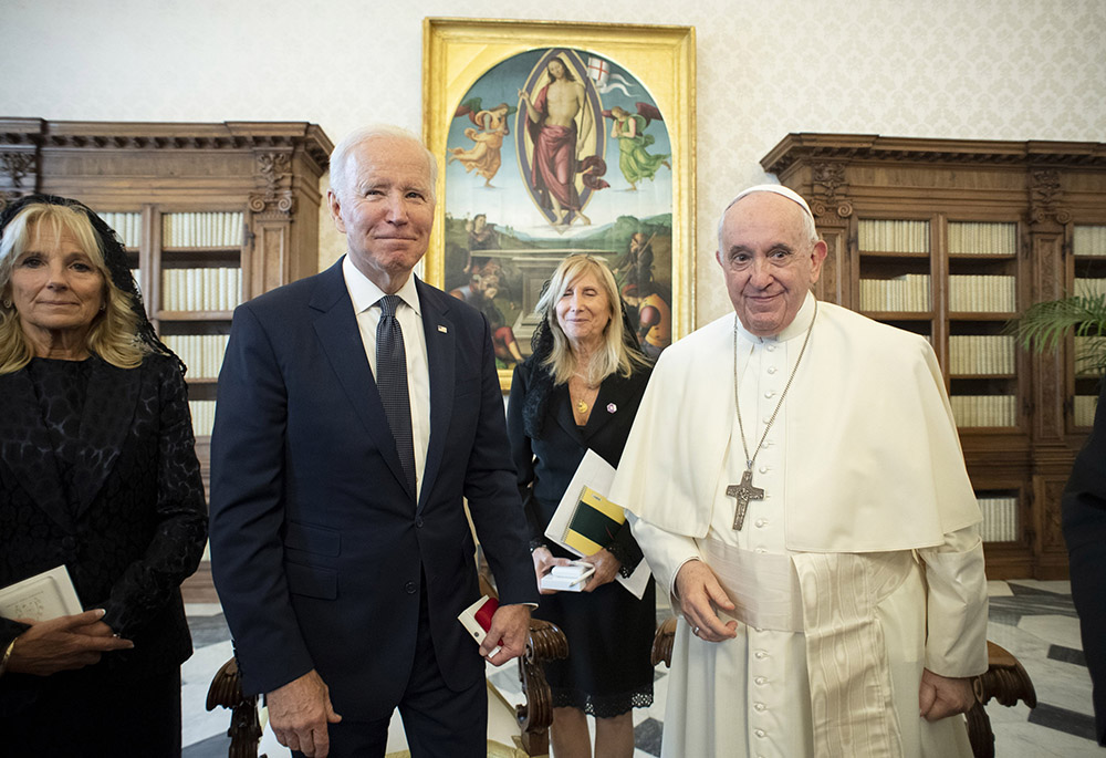 U.S. President Joe Biden, accompanied by his wife, Jill, is pictured with Pope Francis during a meeting Oct. 29 at the Vatican. (CNS/Vatican Media)