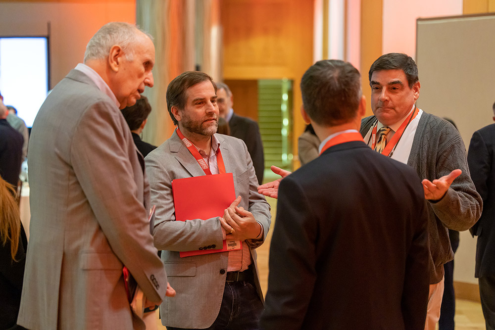 From left: Fr. Anthony Ciorra, vice president for mission and Catholic identity at Sacred Heart University; Grant Kaplan of St. Louis University; and NCR columnist Michael Sean Winters are seen at the conference "Vatican II and Catholic Higher Education: Leading Forward" on Oct. 13. (Sacred Heart University/Chris Zajac)