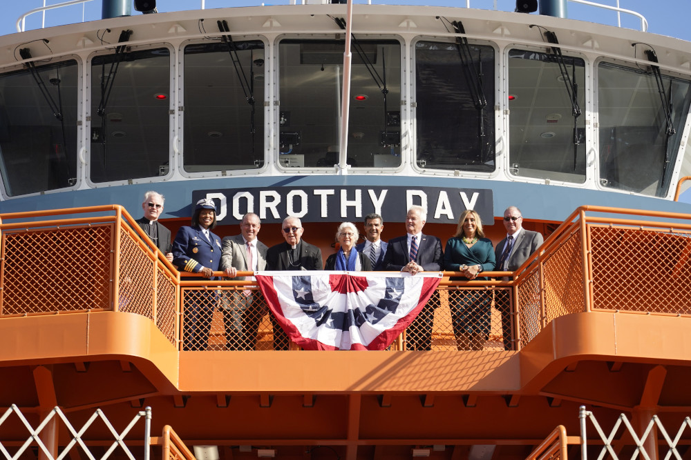 Martha Hennessy, center, granddaughter of Dorothy Day, gathers with other dignitaries Nov. 4, 2022, during a commissioning ceremony for the Dorothy Day ferry boat at St. George Ferry Terminal in Staten Island, N.Y.  