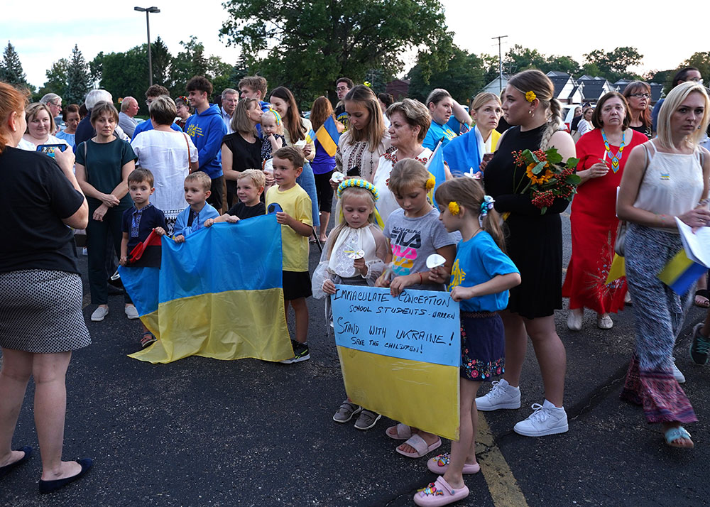 Parents, children and supporters of the Ukrainian Catholic community in southeast Michigan gather Aug. 23 at St. Josaphat Ukrainian Catholic Church in Warren, Michigan, during a prayer vigil. (CNS/Detroit Catholic/Daniel Meloy)