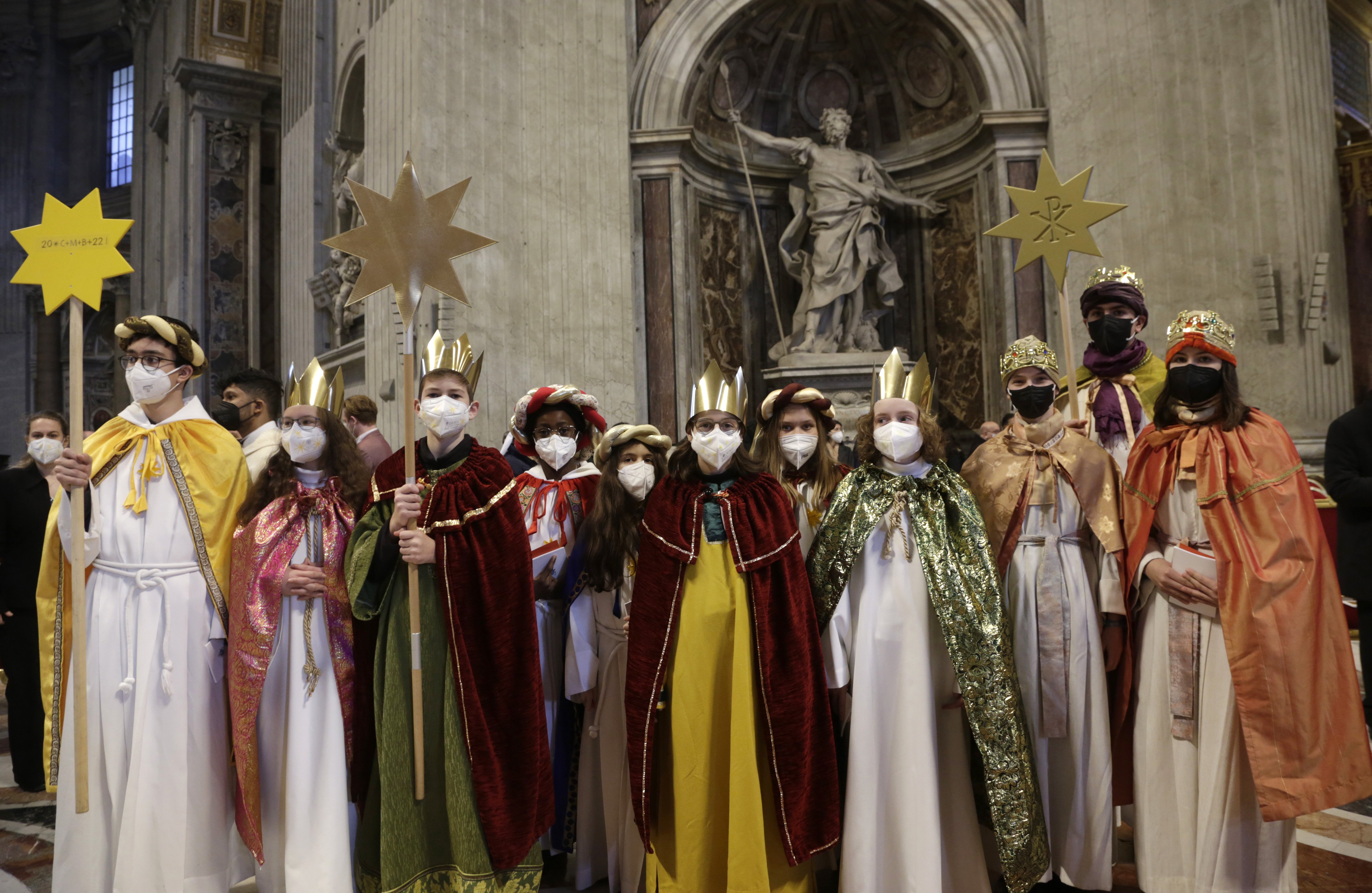 Young people dressed as the Magi are pictured after attending Pope Francis' celebration of Mass on the feast of Mary, Mother of God, at the Vatican Jan. 1, 2022. (CNS photo/Romano Siciliani, pool)