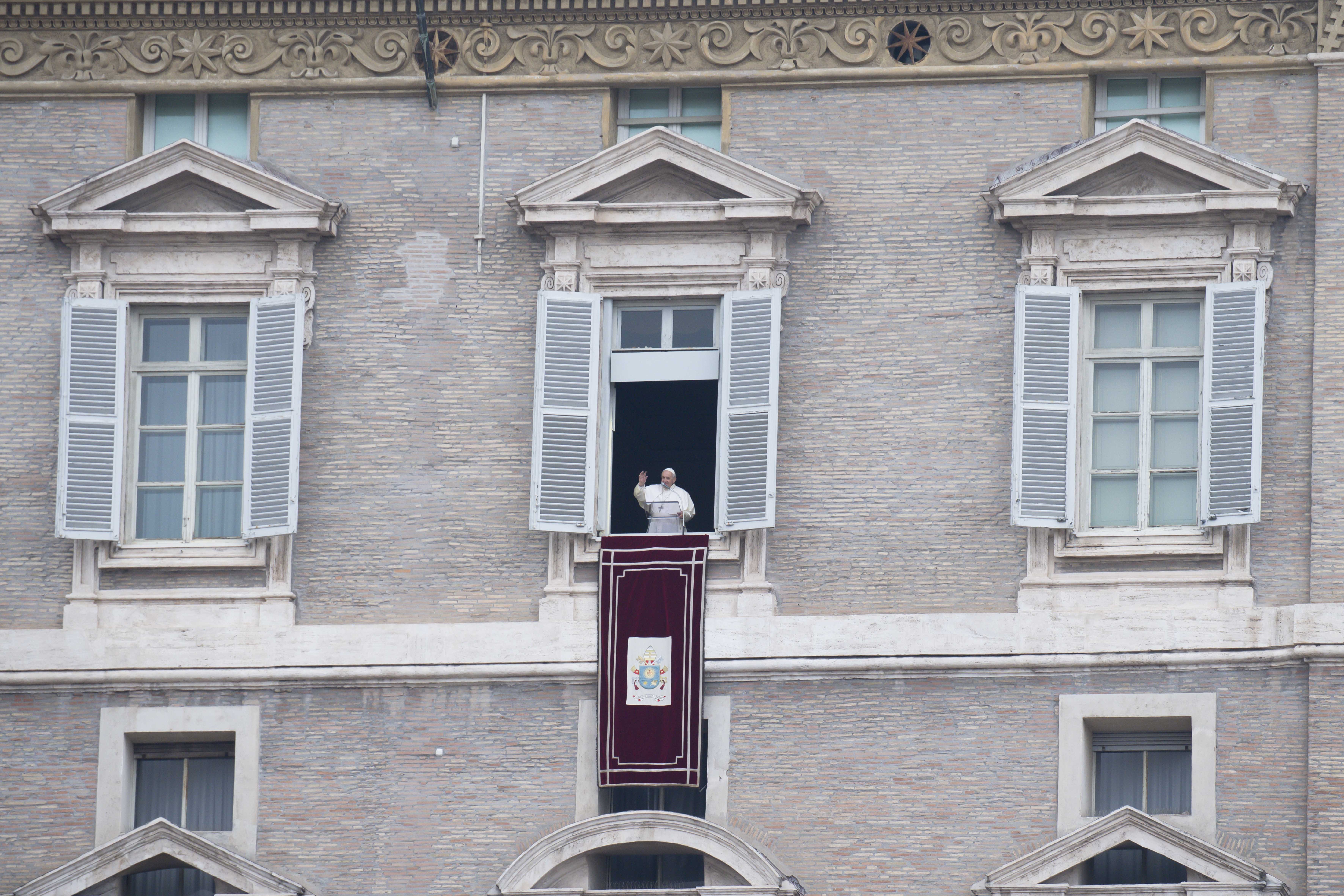 Pope Francis leads the Angelus from the window of his studio overlooking St. Peter's Square at the Vatican Jan. 3, 2021.  (CNS photo/Vatican Media)