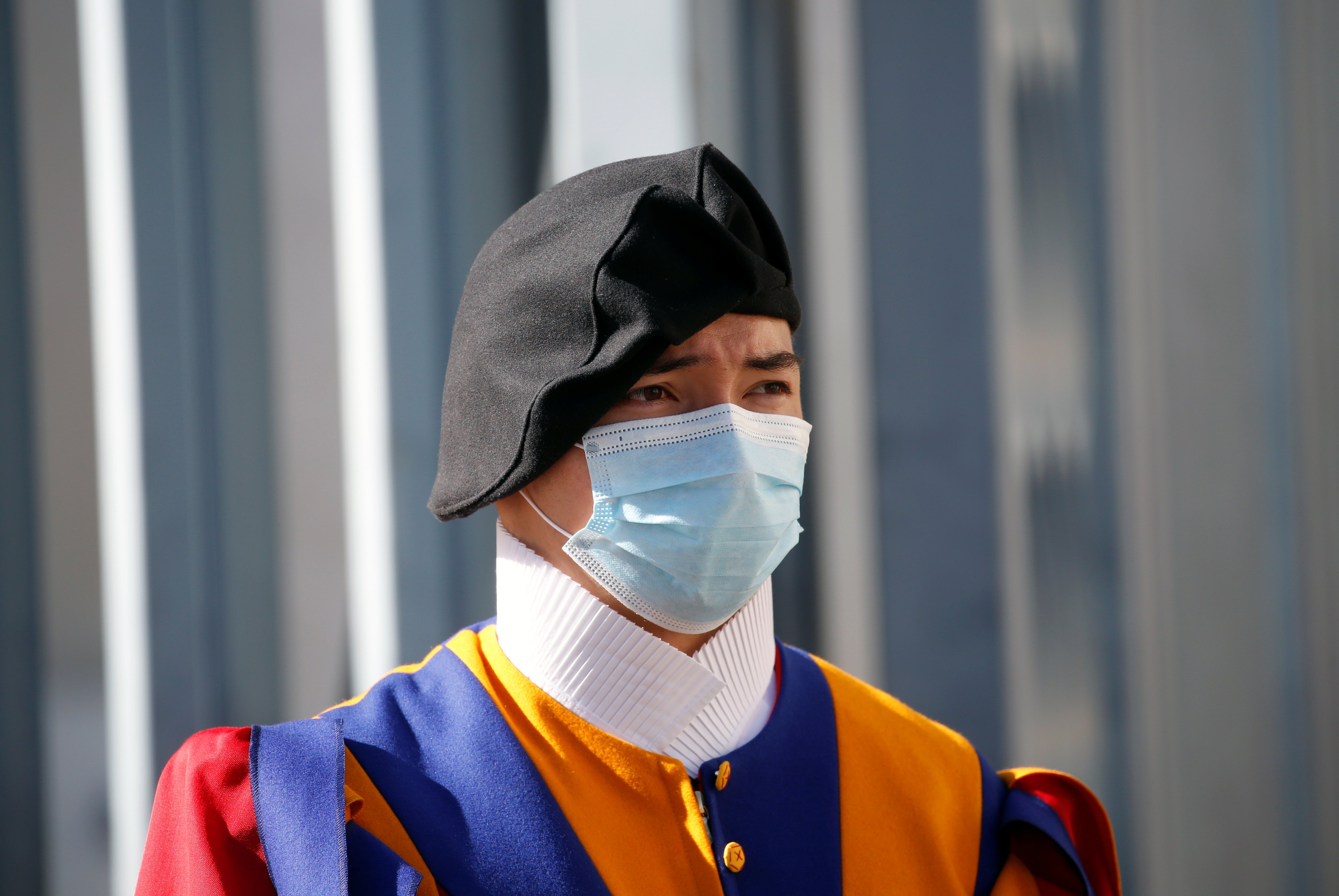 A Swiss Guard wearing protective face masks stands guard at the Vatican May 4, 2020. (CNS photo/Remo Casilli, Reuters)