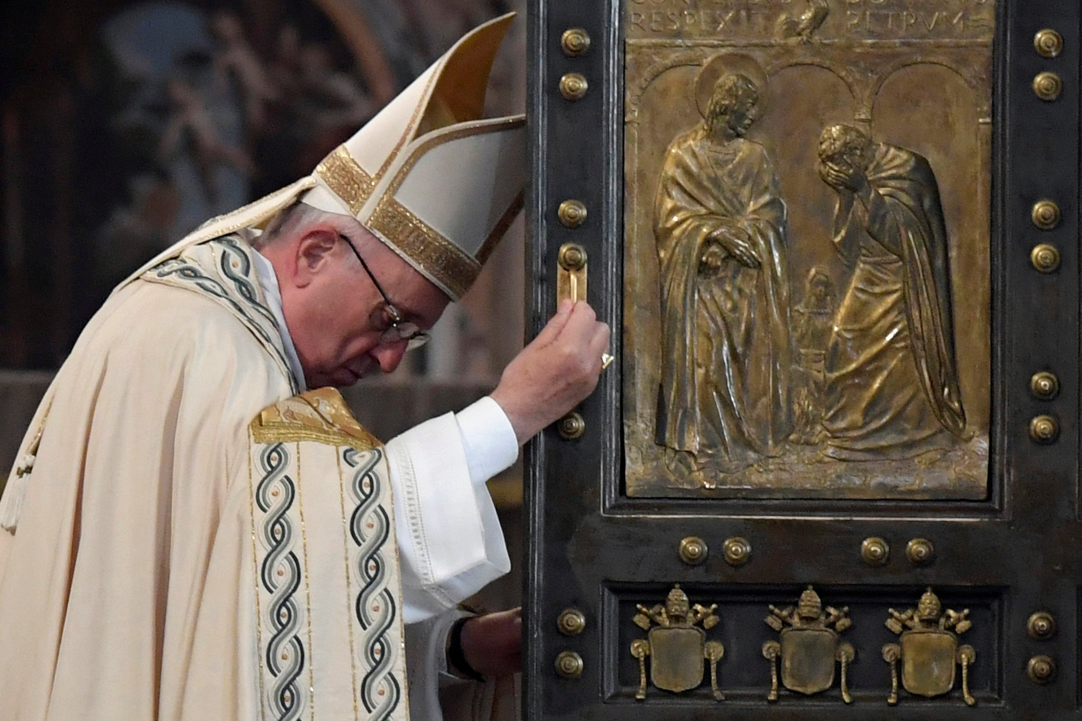 Pope Francis closes the Holy Door of St. Peter's Basilica to mark the closing of the jubilee Year of Mercy at the Vatican, Nov. 20, 2016. (CNS photo/Tiziana Fabi, pool via Reuters)