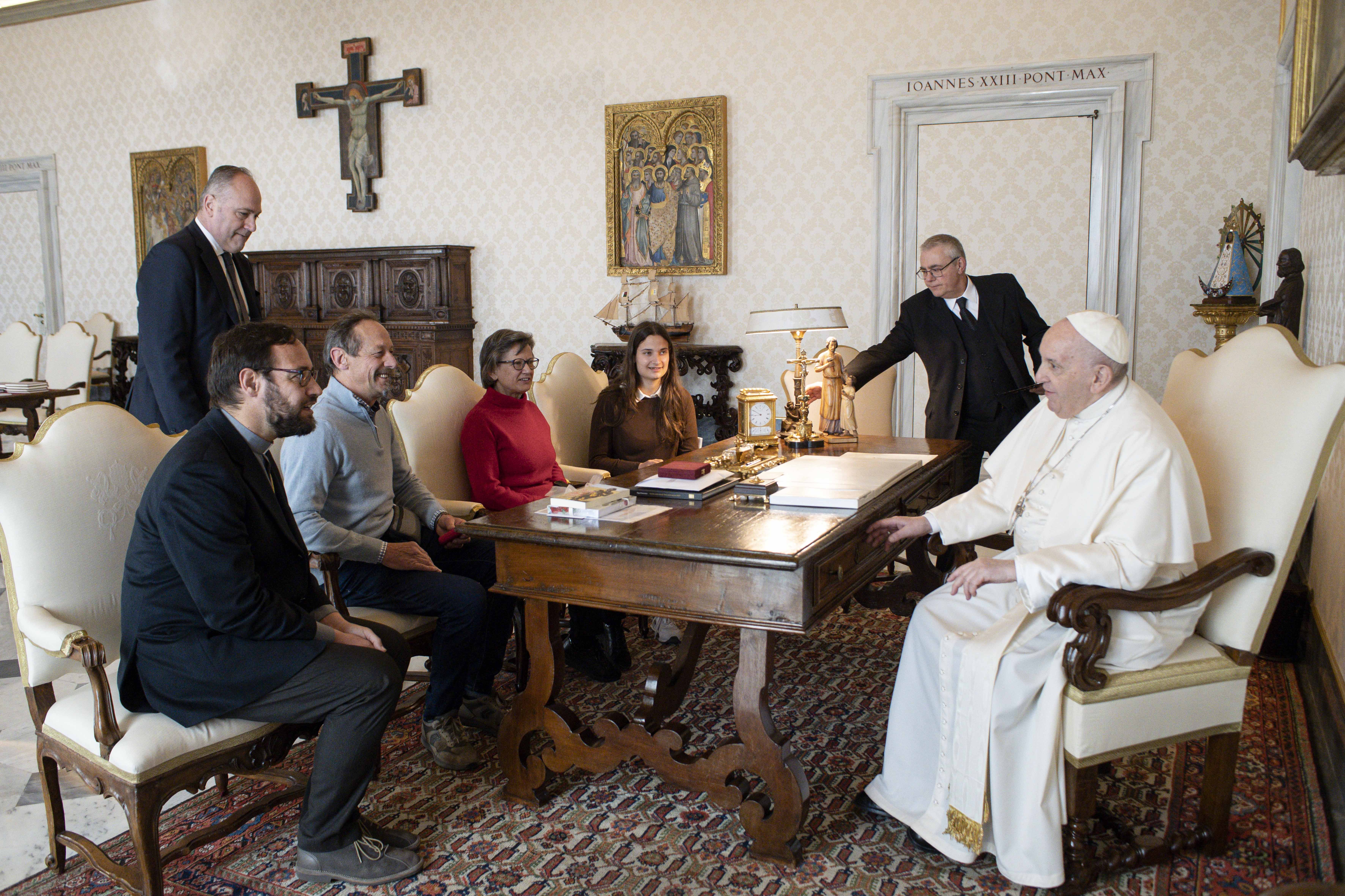 Pope Francis meets Bishop-designate Christian Carlassare of Rumbek, South Sudan, left, and his delegation during an audience at the Vatican March 14, 2022. (CNS photo/Vatican Media)