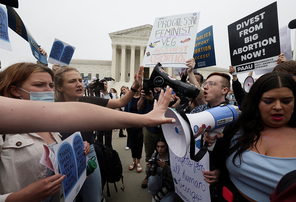 Abortion demonstrators in Washington are seen May 3 outside the U.S. Supreme Court, after the leak of a draft majority opinion written by Justice Samuel Alito preparing for a majority of the court to overturn Roe v. Wade. (CNS)