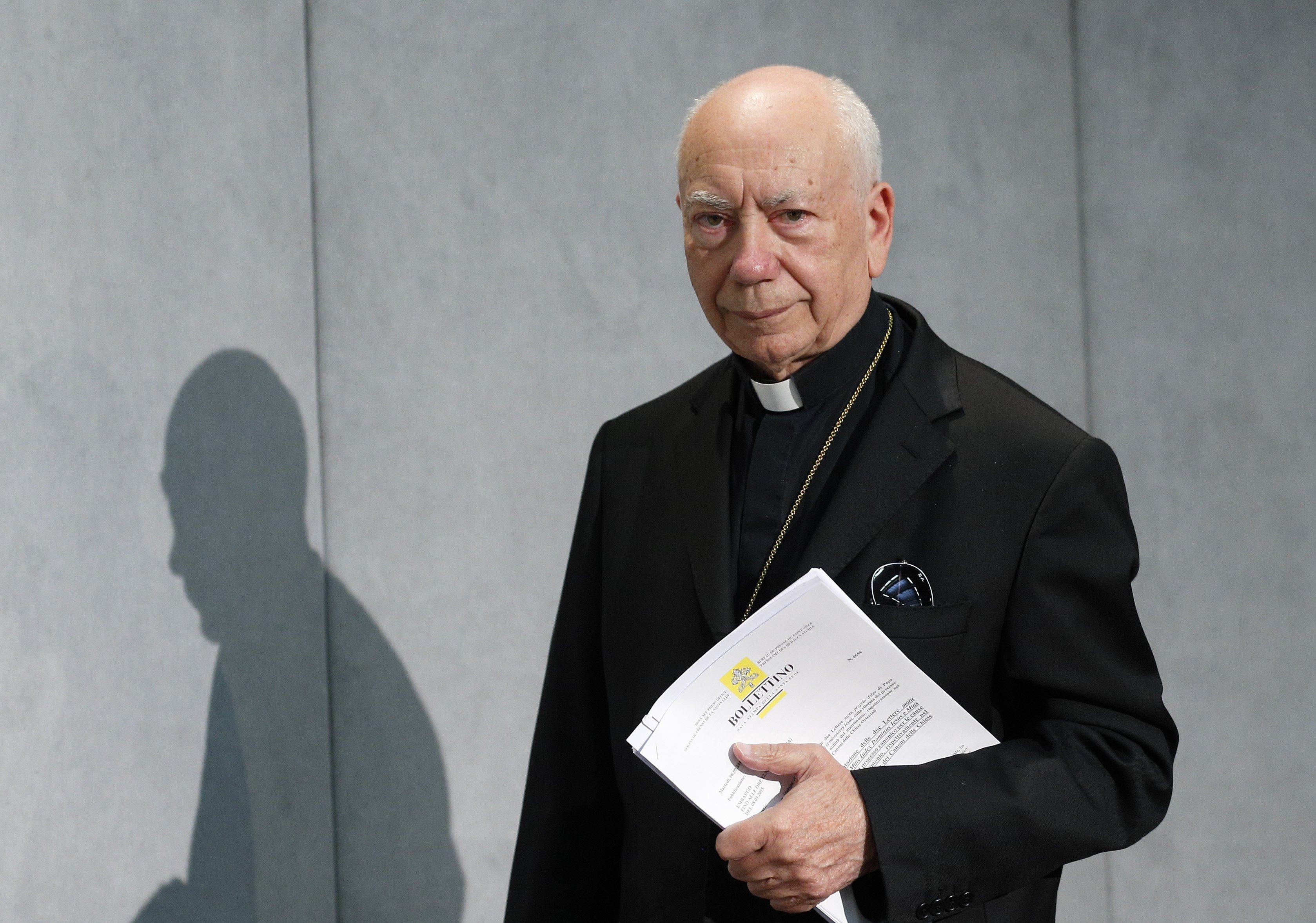 Cardinal Francesco Coccopalmerio, then-president of the Pontifical Council for Legislative Texts, arrives for a news conference at the Vatican in this Sept. 8, 2015.  (CNS photo/Paul Haring)