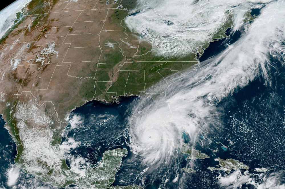 Hurricane Ian makes its way to Florida's west coast after passing Cuba in a composite image from the National Oceanic and Atmospheric Administration Sept. 27, 2022. (CNS photo/NOAA, Handout via Reuters)