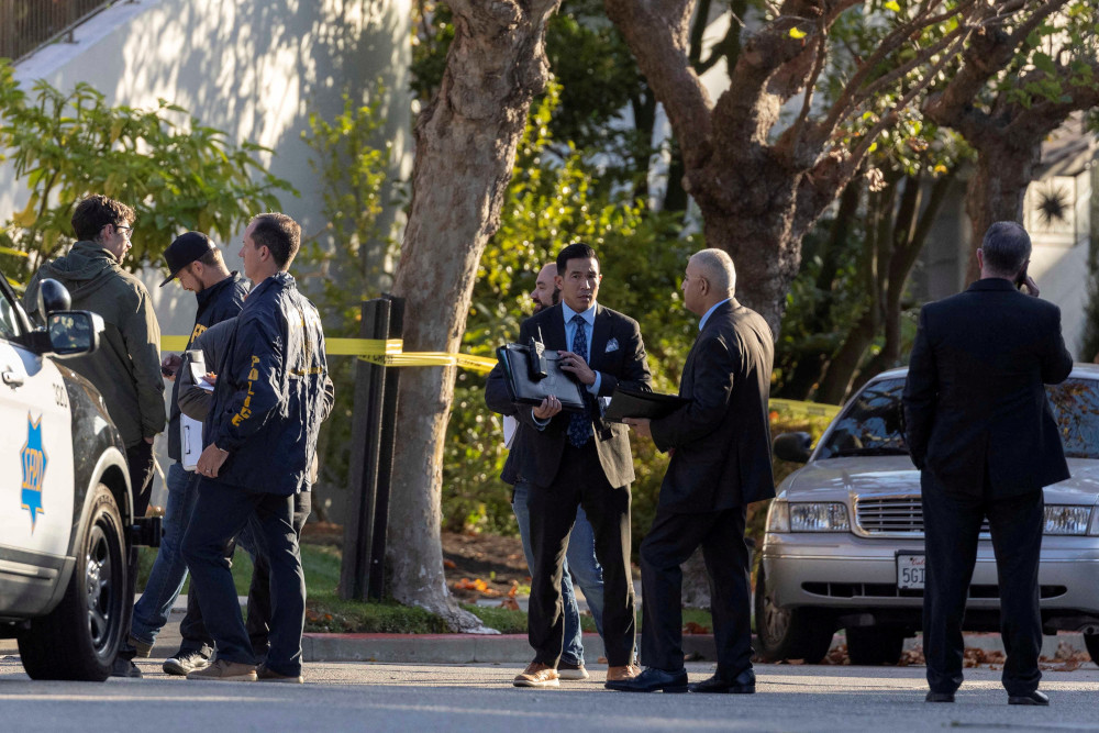 Members of law enforcement in San Francisco work outside the home of House Speaker Nancy Pelosi Oct. 28, 2022, where her husband Paul Pelosi was violently assaulted after a break-in at their house. (CNS/Reuters/Carlos Barria)