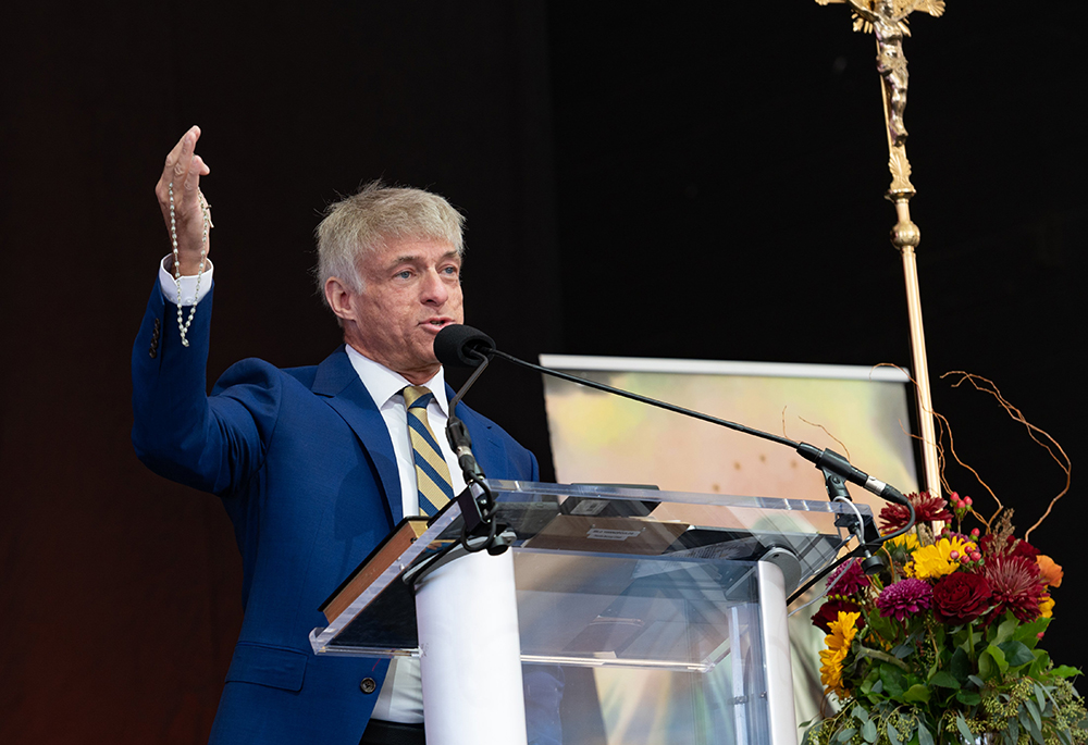 Michael Voris, founder of Church Militant, leads the praying of the rosary in Baltimore Nov. 16, 2021, during the organization's rally near the hotel where the U.S. Conference of Catholic Bishops was holding its fall general assembly Nov. 15-18. (CNS/Catholic Review/Kevin J. Parks)