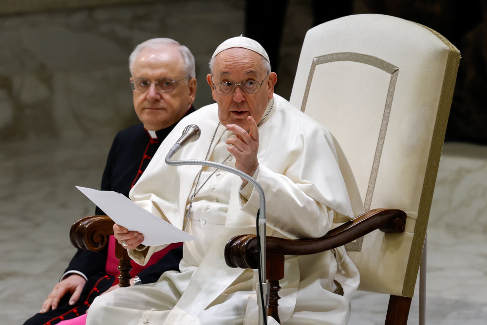 Pope Francis speaks to Vatican employees and their families ahead of Christmas in the Paul VI Audience Hall at the Vatican Dec. 21, 2023. (CNS photo/Lola Gomez)