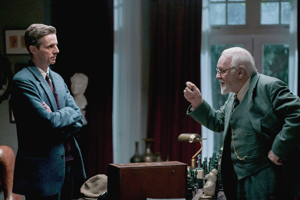 Matthew Goode as C.S. Lewis (left) and Anthony Hopkins as Sigmund Freud in the film "Freud’s Last Session" (Courtesy of Sony Pictures Classics/Sabrina Lantos)