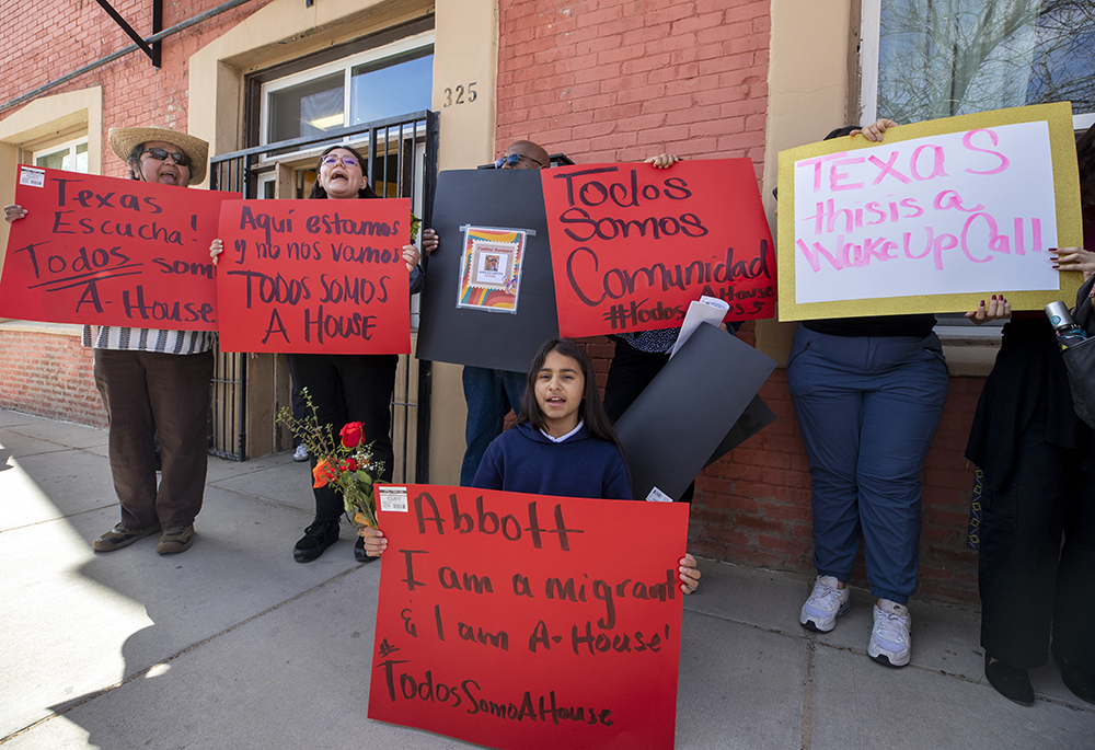 Honesty Tercero, 11, demonstrates with fellow residents their support for Annunciation House, a network of migrants shelters Feb. 23 in El Paso, Texas. Texas Attorney General Ken Paxton filed a lawsuit claiming the Annunciation House "appears to be engaged in the business of human smuggling" and is threatening to terminate the nonprofit's right to operate in Texas. (AP photo/Andres Leighton)