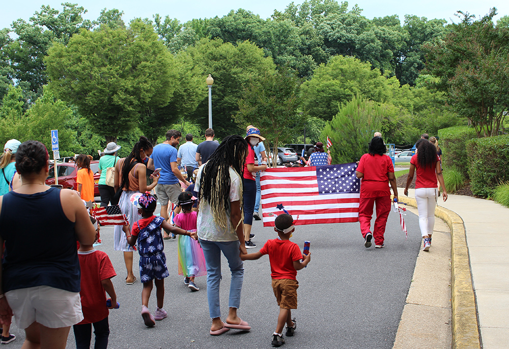 Children with the child care program at St. Ann's Center for Children, Youth and Families participate in a Fourth of July Parade. (Courtesy of St. Ann's Center for Children, Youth and Families)