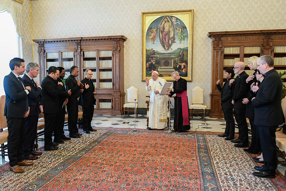 Pope Francis gives his blessing during an audience with members of the International Commission on the Apostolate of Jesuit Education at the Vatican May 24, 2024. (CNS/Vatican Media)