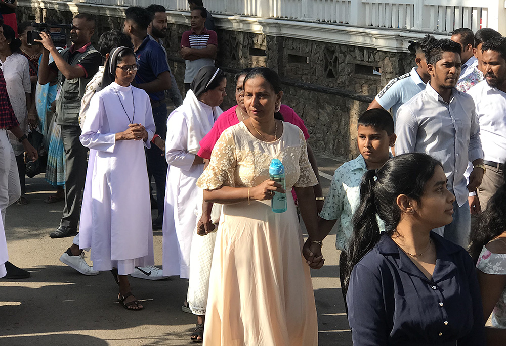 Some Dominican Sisters serving the parish joined the Easter procession on March 31. (Thomas Scaria)