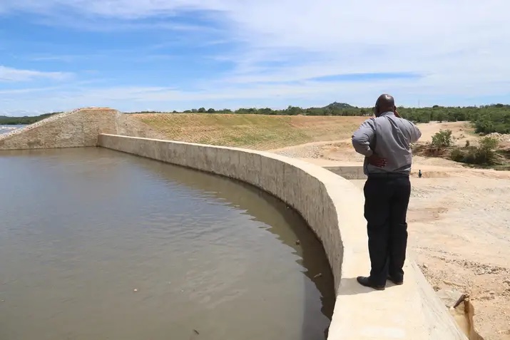 Bishop Rudolf Nyandoro of the Catholic Diocese of Gweru in Zimbabwe inspects the Holy Cross Dam in a February 2024 photo. (Courtesy of the Diocese of Gweru)