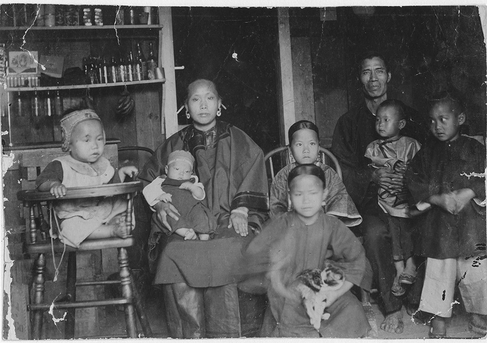 A Chinese family in Honolulu, Hawaii, in 1893. In much of the U.S., immigrants from Asia experienced intense discrimination. (Wikimedia Commons/Hawaii State Archives)