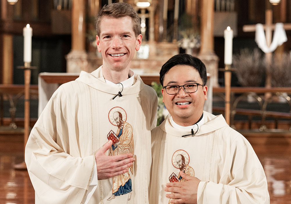 Paulists Fr. Chris Lawton and Fr. Dan Macalinao are pictured after their ordination Mass, at St. Paul The Apostle Church on May 18 in New York City. (Courtesy of Zachera Wollenberg)