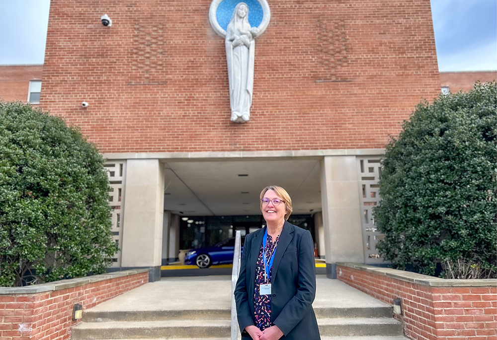 Sr. Nancy Downing, a member of the Congregation of Notre Dame, stands in front of St. Ann's Center for Children, Youth and Families, where she became new CEO in January. (Courtesy of the Catholic Standard/Mihoko Owada)