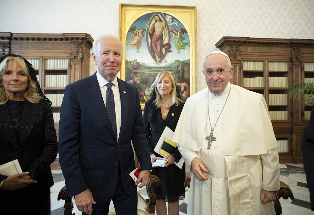 U.S. President Joe Biden, accompanied by his wife, Jill, is pictured with Pope Francis during a meeting at the Vatican Oct. 29, 2021. (CNS/Vatican Media)