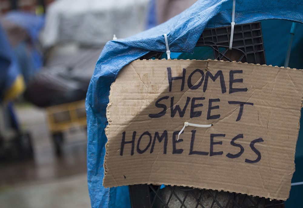 A sign is pictured in a file photo at a homeless encampment in Seattle. (OSV News/Reuters/David Ryder)