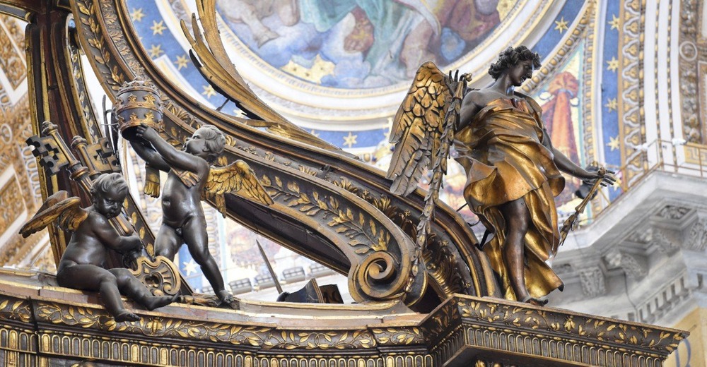 Sculpted angels pictured from below backed by frescoed walls and dome. 