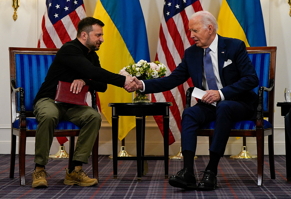 U.S. President Joe Biden shakes hands with Ukrainian President Volodymyr Zelenskyy June 7 in Paris, France. (OSV News/Reuters/Elizabeth Frantz)