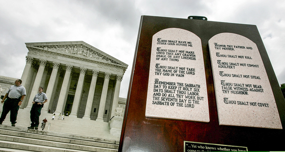 Stone tablets depicting the Ten Commandments are shown outside the Supreme Court in Washington June 27, 2005, placed there during a vigil by a religious group. In Louisiana, public school classrooms will now be required to display the Ten Commandments by the start of 2025 as part of a new educational reform law signed by Gov. Jeff Landry June 19. (OSV News/Reuters/Jason Reed)