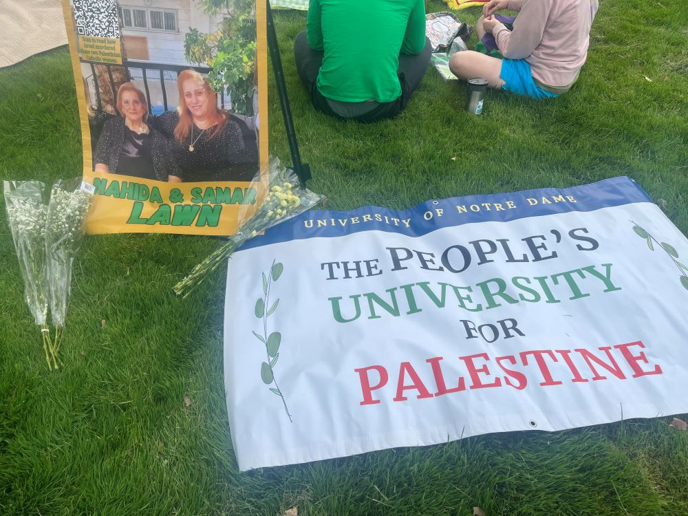 During the May 2 protest at Notre Dame, a banner depicted two women, with lettering below that read "Nahida & Samar Lawn," in honor of a Catholic Palestinian mother and daughter killed in Gaza. (Sarah Seto)
