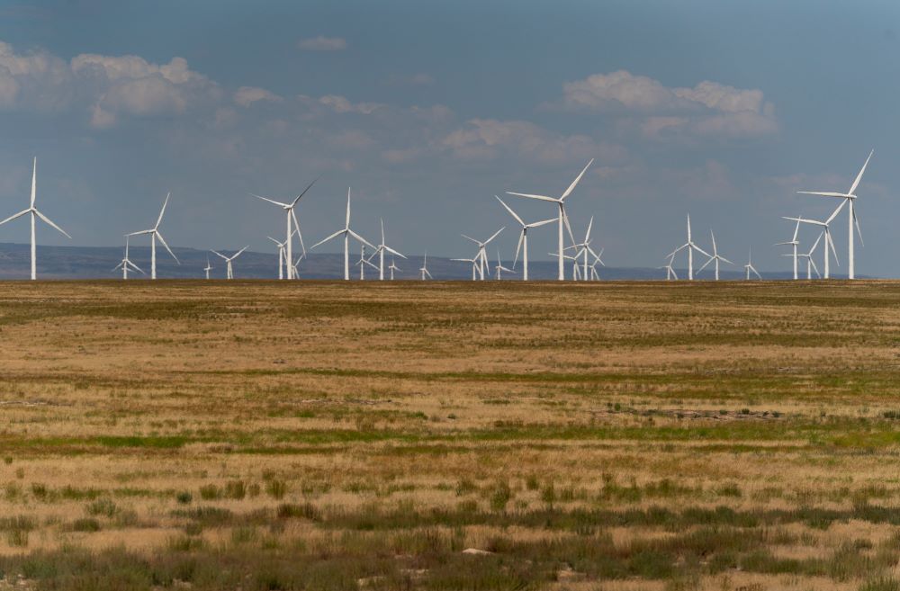 Wind turbines are seen from Interstate 84, July 9, 2023, near Hammett, Idaho. 