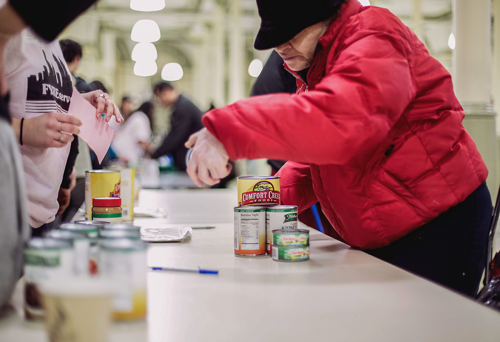 Xavier Mission hosts a food pantry distribution at St. Francis Xavier Church in New York City in 2018. (Ashley Mosher)